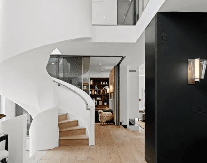 Modern interior with curved staircase